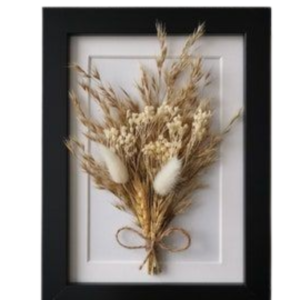 Dried flower bouquet in frame