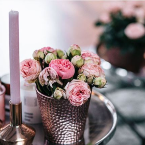 This image shows dried flower decor around candles