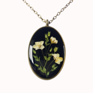 Beautiful White Dried Flower Necklace in black background