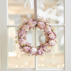 This image shows a beautiful pink rose wreath 