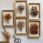 Beautiful dried flower frame decor on home entrance wall