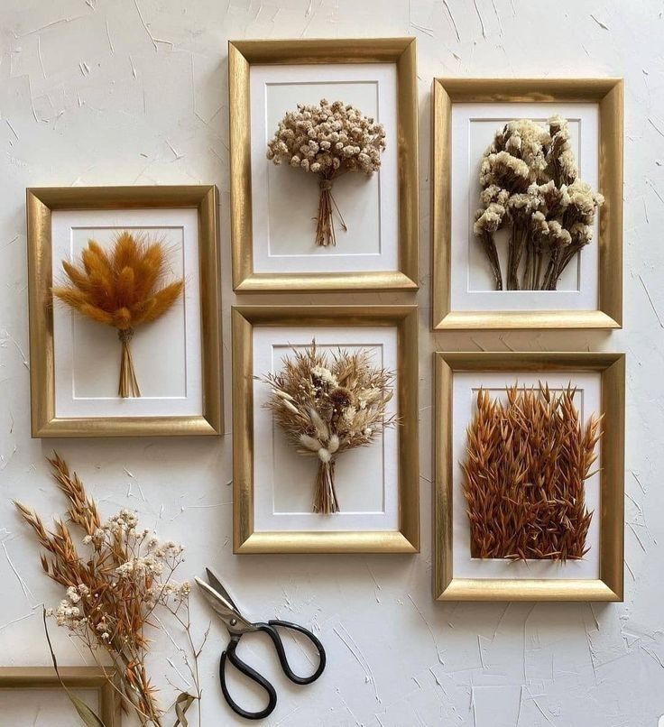 Beautiful dried flower frame decor on home entrance wall